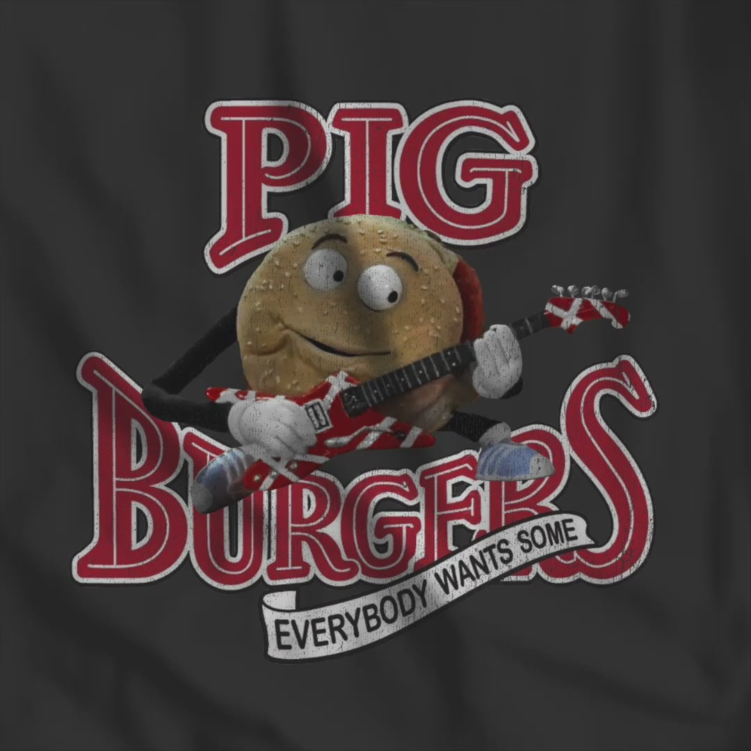 Video of soft Bella Canvas Tee featuring vintage Pig Burgers logo with Van Halen guitar from the movie Better Off Dead.