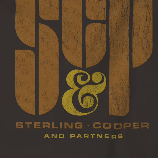 Video closeup of soft unisex Bella+Canvas 3001 short-sleeve t-shirts featuring the Sterling Cooper & Partners logo graphic from the TV Show Mad Men in a vintage distressed style, sold by ScriptedBrand.